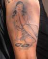 Pin up girl w/ record player tattoo