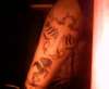 Rose growing from concrete,cross and two dove(1 with horus eye) tattoo