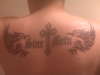 Wings, Cross, and Without Fear in Latin tattoo