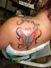 butter fly and tribals tattoo