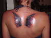 Angel wings tattoo