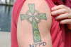 NYPD under Celtic Cross tattoo