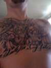 Prison chest plate tattoo