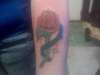 Rose  and banner tattoo