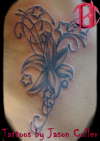 flower and swirly shit lol tattoo
