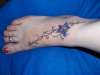 foot  flower tattoo