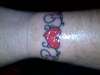 hearts on wrist tattoo