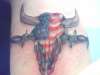 bull skull with american flag tattoo