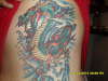 dragon in waves tattoo