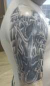tat from another angle tattoo