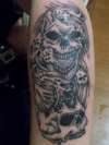Skulls with demons tell me what you think tattoo