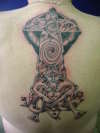 celtic cross and man tattoo