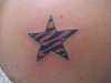 pink and black zebra striped star  rate me please tattoo