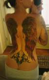 upper and lower back tattoo wings and tribal