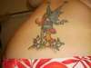 Lower Back Fairy and Mushroom tattoo
