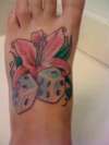 Pink Lily with Dice tattoo