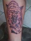 WOLF ON EDGE OF CLIFF. tattoo