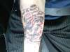bleeding heart with banner tattoo
