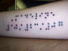 Braille name tattoo