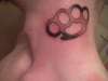 Brass knuckes. tattoo