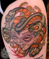 Chopped Madusa tattoo