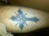 Cross design tattoo