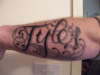 My sons name tattoo