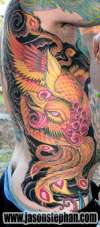 Phoenix rib panel tattoo