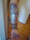 angle over scroll tattoo
