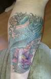 blue koi and lotus finished tattoo