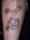capricorn peace tattoo