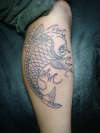 Koi fish with lotus flower tattoo