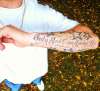 Only God Can Judge Us tattoo