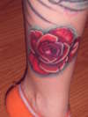 Rose tat by me tattoo