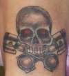 Skull and Pistons tattoo