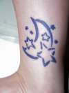purple moon and stars tattoo