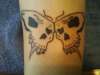 skull butterfly tattoo