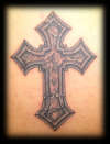 stoned cross tattoo