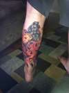 Exploding grenade tattoo