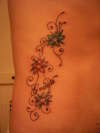 Side panel flowers tattoo
