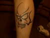 Skull on Leg tattoo