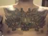 biomech chest tattoo
