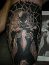 black spidey tattoo