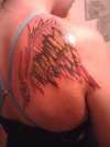 flaming  angle tattoo