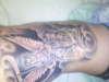 guardian angels on ribs tattoo