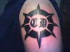 my initial in a tribal tattoo