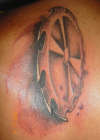 sawblade tattoo