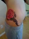 roses ribcage starter tattoo