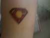 super C tattoo