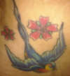 swallows w/flowers added tattoo